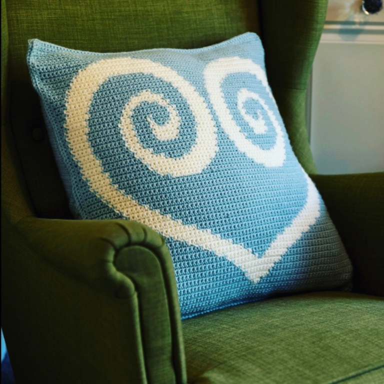 Blue crochet swirl heart pillow