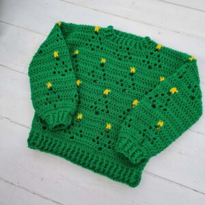 Green crochet sweater yellow flowers