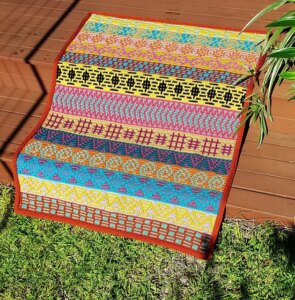 Vibrant patterned crochet blanket