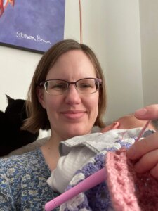 Woman, baby, crochet, cat