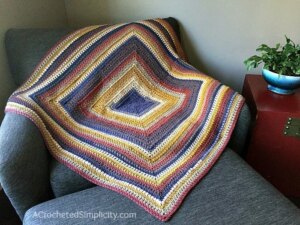 Colorful striped crochet blanket