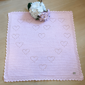 Pink crochet heart blanket