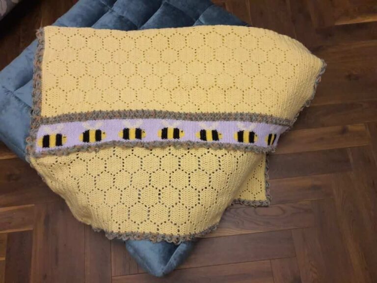 Yellow knitted bee blanket