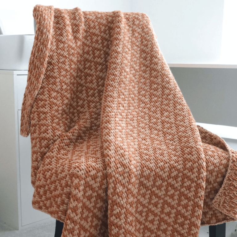 Orange textured knit blanket