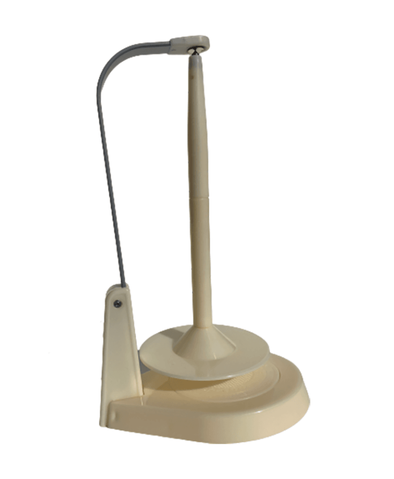 Cream plastic yarn winder