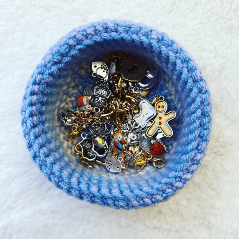 Crochet basket with metal charms