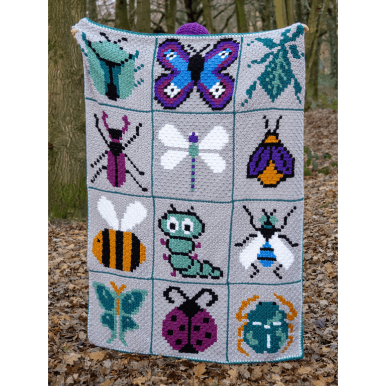 Colorful pixelated insect crochet blanket
