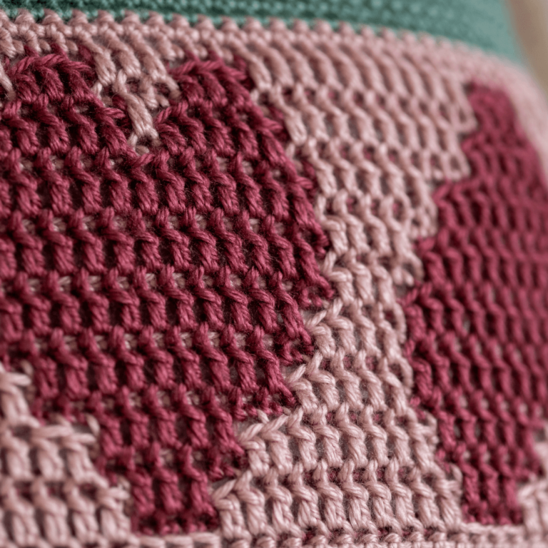 Knitted maroon pink fabric texture