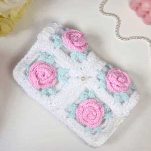 Crochet white rose clutch