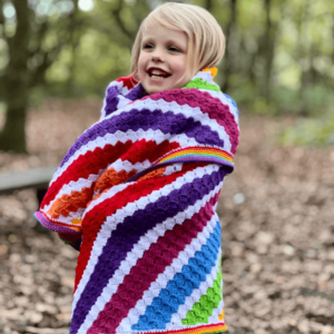 Joyful child rainbow crochet blanket