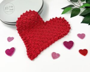 Red crocheted heart hot pad