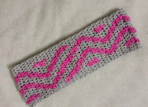 Grey pink zigzag crochet fabric