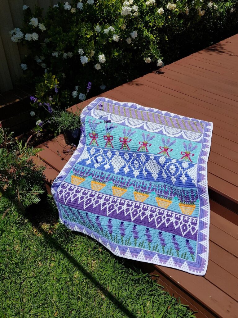 Crocheted lavender floral blanket
