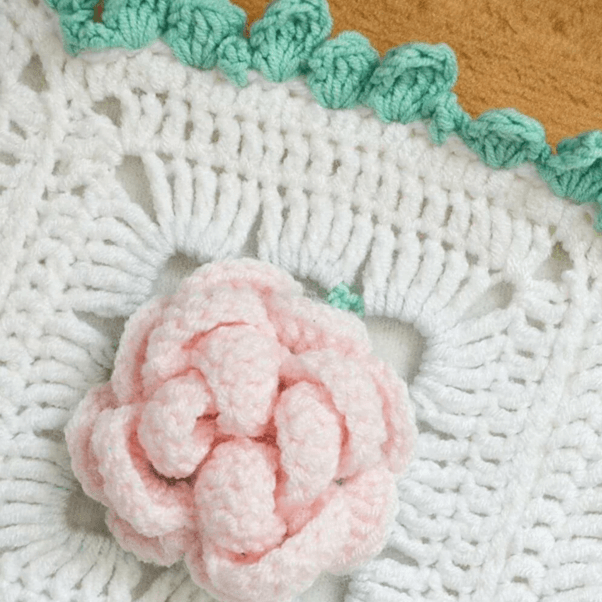 Pink crochet flower white lace