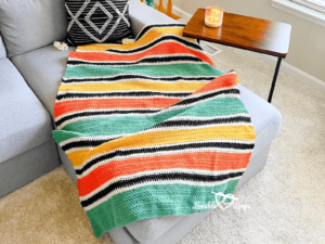 Vibrant striped crochet blanket