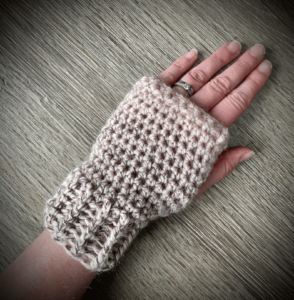 Pink crocheted fingerless glove