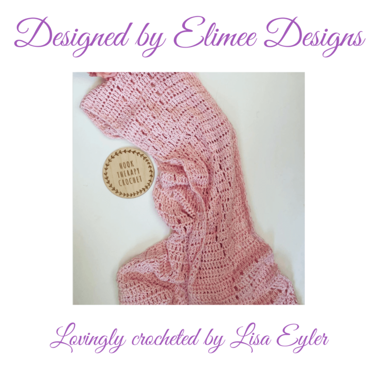 Pink crocheted blanket with tag