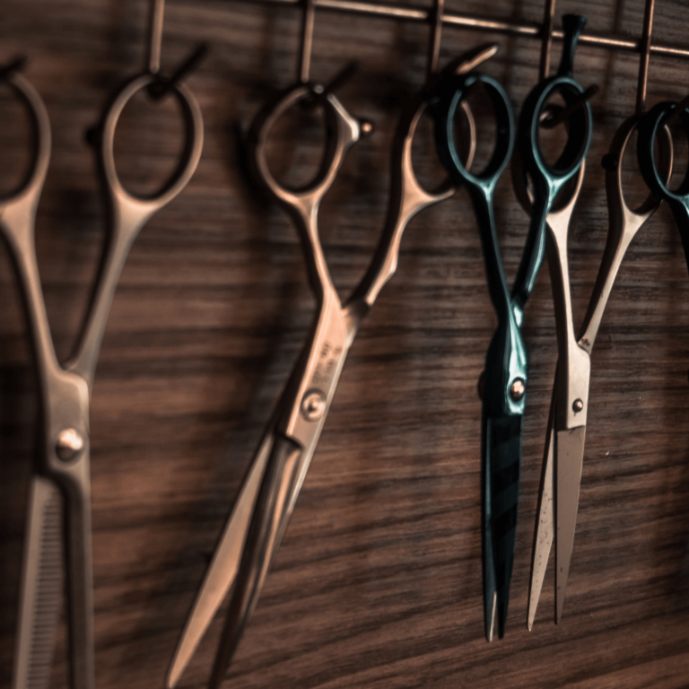 Barber scissors hanging wood