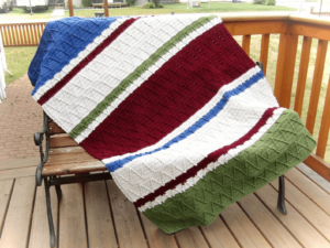 Colorful striped knitted blanket